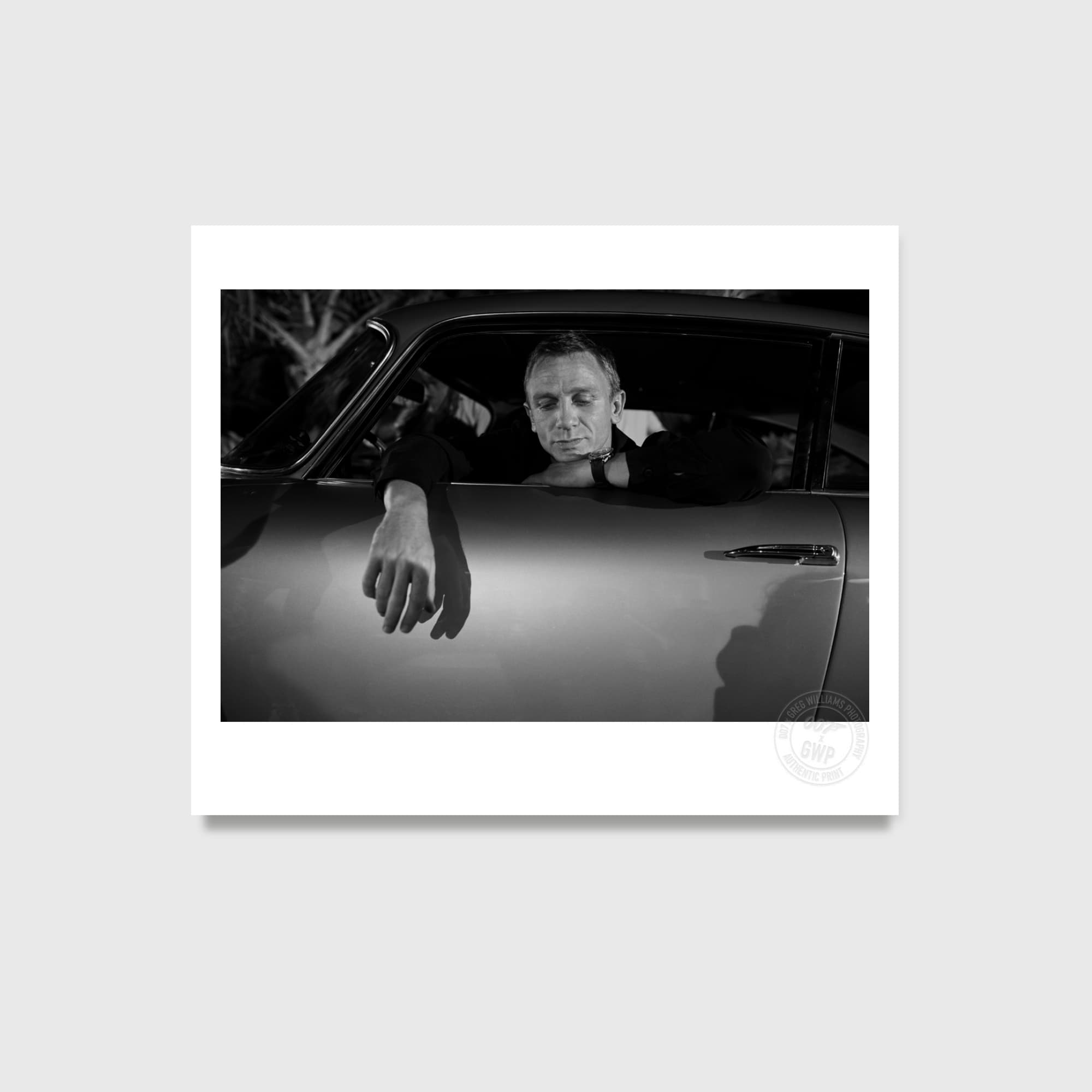 Daniel Craig in the Aston Martin DB5, Bahamas, Casino Royale, 2006. Photograph by Greg Williams.