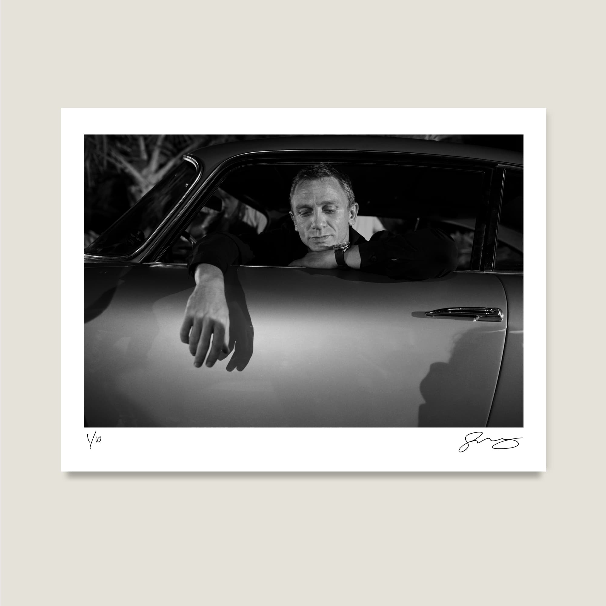 Daniel Craig in the Aston Martin DB5, Bahamas, Casino Royale, 2006. Photograph by Greg Williams.